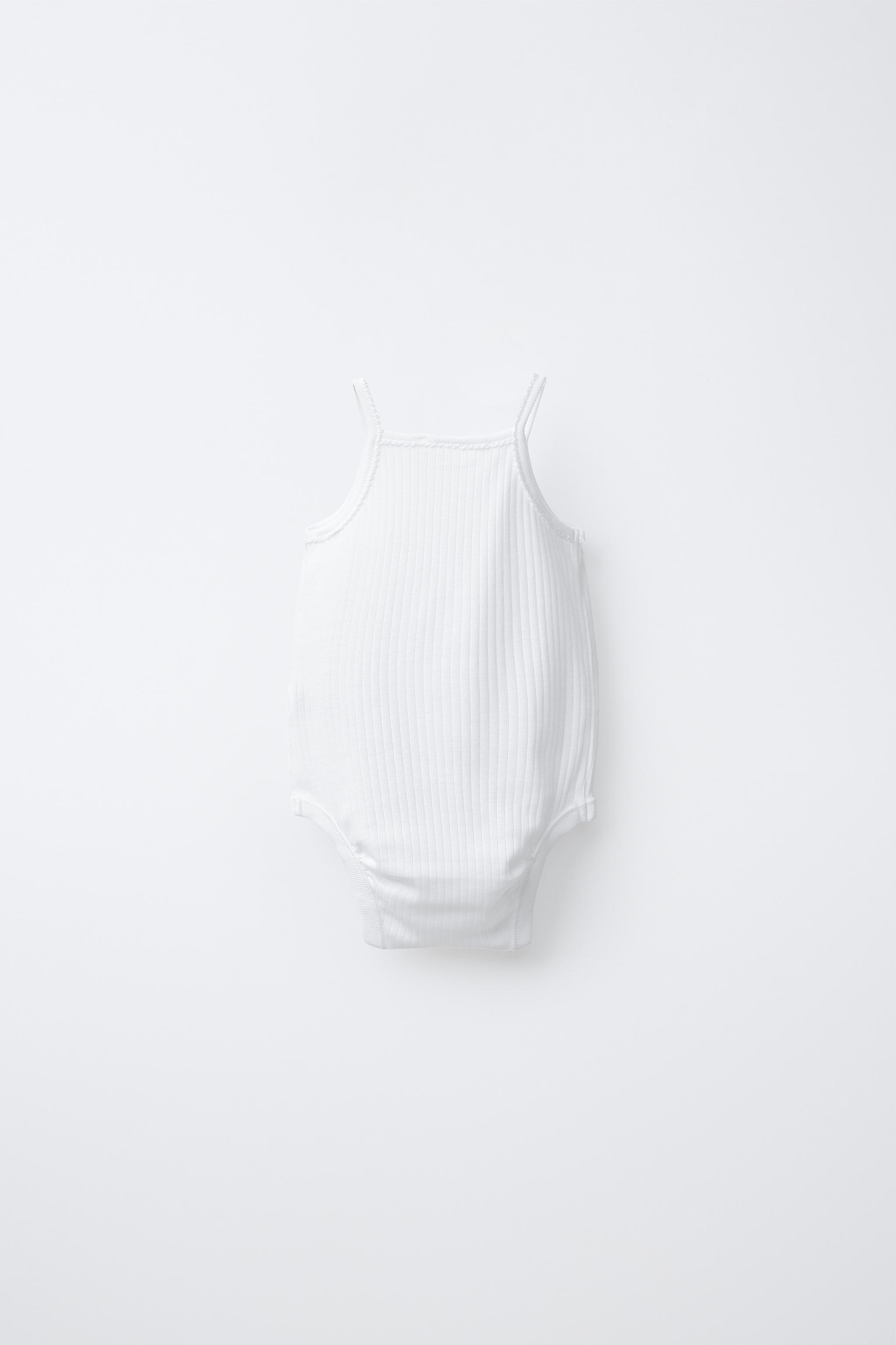 THREE-PACK OF STRAPPY BODYSUITS